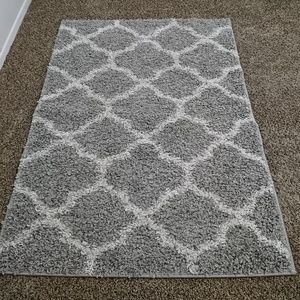 Grey and white house rug